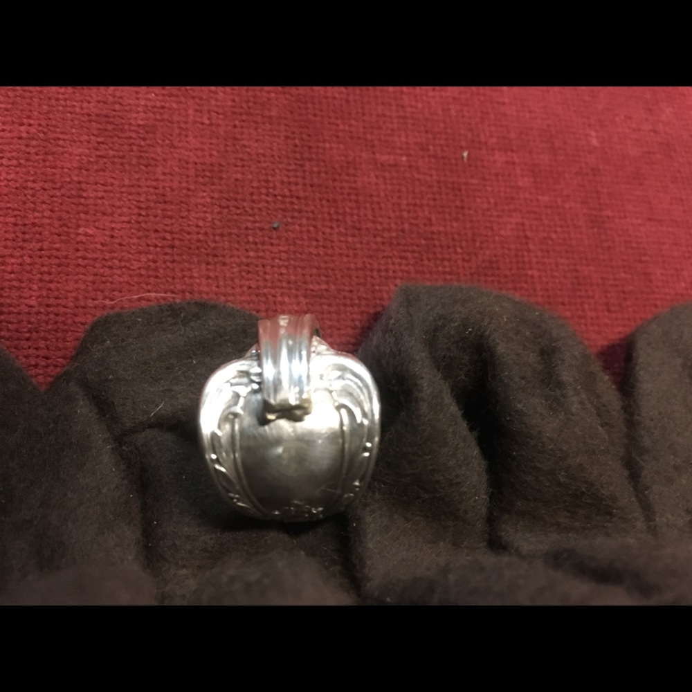 Custom made sterling ring made from vintage spoons